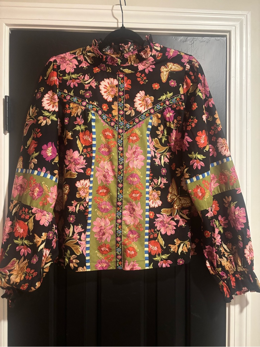 Black Floral Ruffle-Neck Blouse with Pink and Green Accents